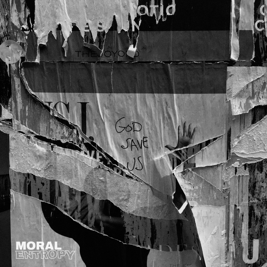 God Save Us cover art. The words "god save us" are scrawled in all caps, written in sharpie, on top of a thick bed of wheat paste posters. Adjacent to the text is a hand, outstretched, reaching upwards.